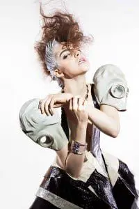 Sasu Tei photography: dress by Reem, necklace Atelier Swarovski by Holly Fulton, tube bangle Atelier Swarovski by Kirt Holmes, cuff bangle Atelier Swarovski by Joseph Altuzarra.