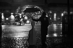 coat Richard Anderson, shirt & trousers Ben Sherman, bow-tie & shoes Beyond Retro, umbrella London Undercover