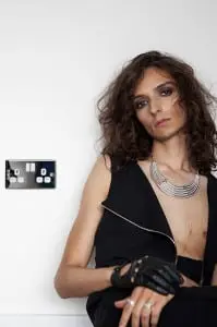 jumpsuit by Under, glove stylist's own, necklace stylist's own