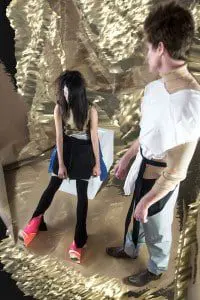 Je t'aime by Taner Tumkaya: Mark wears tan turtle neck by Lord & Taylor, grey trousers, white vest and black belt by Harold Kensington. Anita wears tan & blue top, ripped skirt and leggings by Harold Kensington, shoes by Ekaterina Kensington, jewellery by Charles Albert