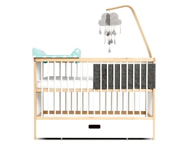 Why is it smarter to invest in a mini cot bed rather than a standard baby cot?