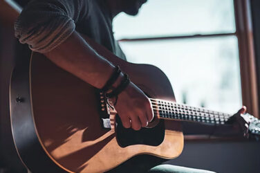 play Acoustic Guitar